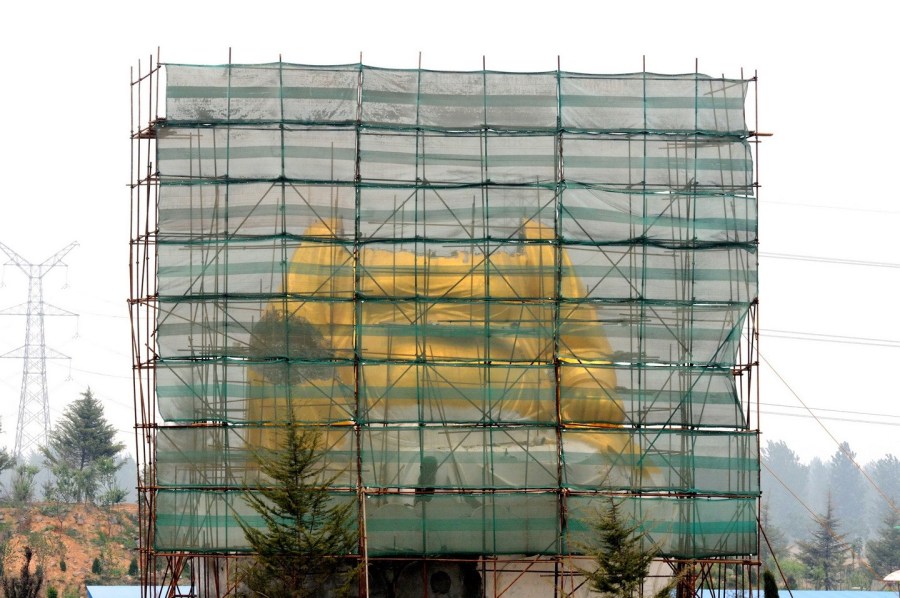 洛陽(yáng)大背頭彌勒佛“整容” 頭部被移走