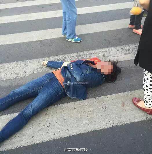 女子過路闖紅燈遭協(xié)管員鐵錘爆頭