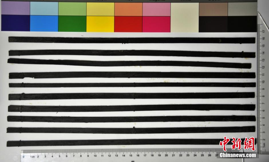 圖為漢代簡牘出土930支竹簡，在四川地區(qū)首次發(fā)現(xiàn)漢代簡牘。