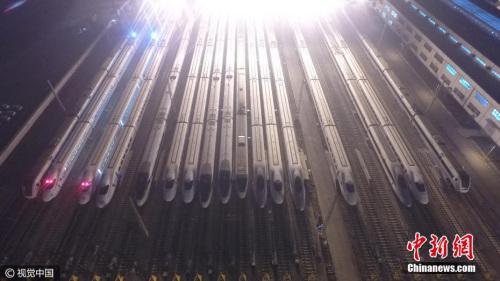 資料圖：高鐵“萬箭齊發(fā)”勢如“陸地航母”。 圖片來源：視覺中國