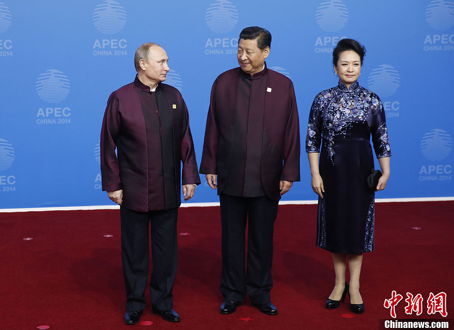 圖為習(xí)近平夫婦歡迎俄羅斯總統(tǒng)普京。中新社發(fā) 杜洋 攝